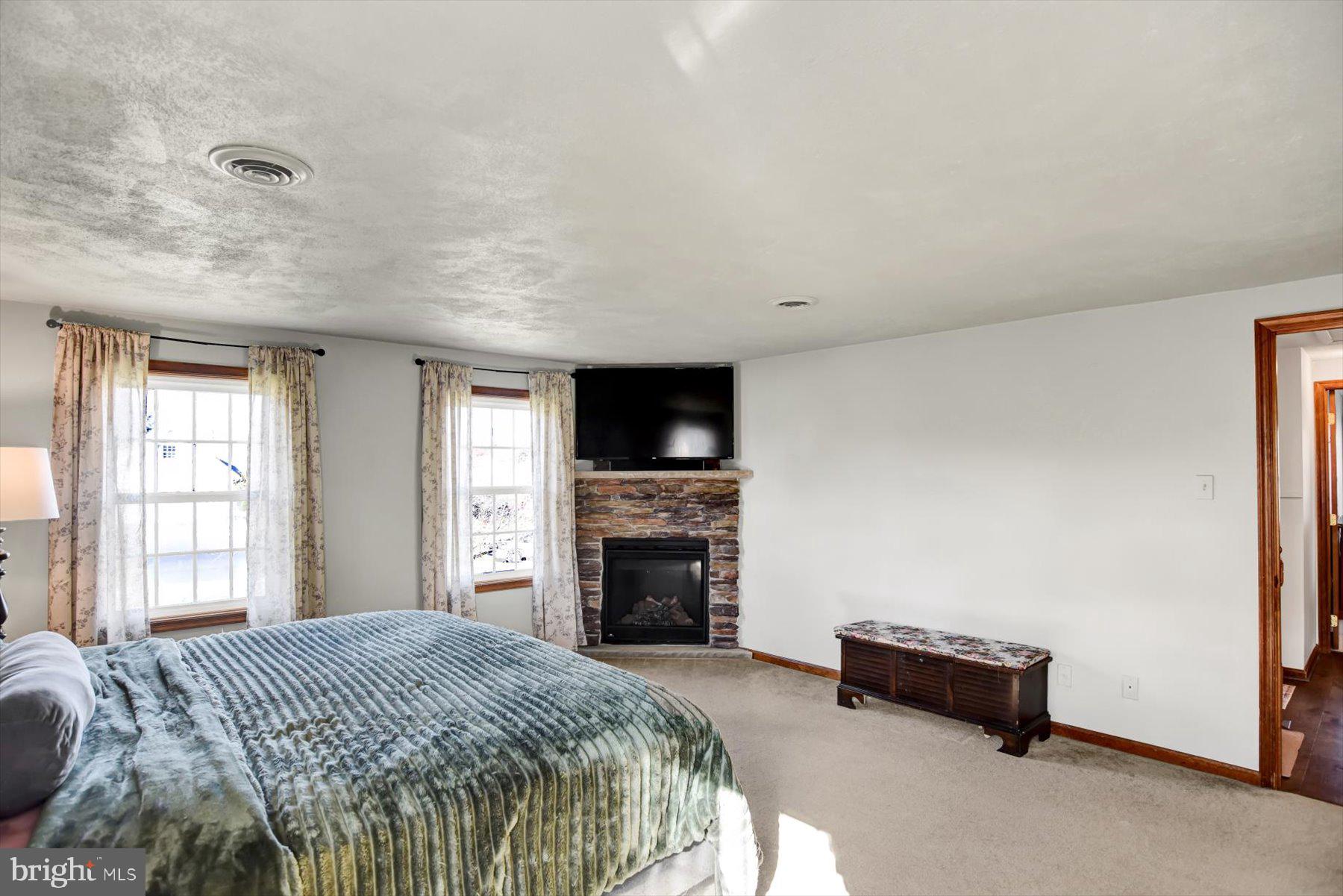 6 James Street Mill Hall, PA 17751 - Photo 18 of 39 a bedroom with a bed and a television