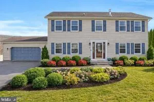 front view of a house with a yard