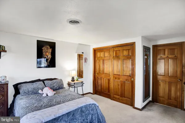 a picture of a fireplace with wooden floor