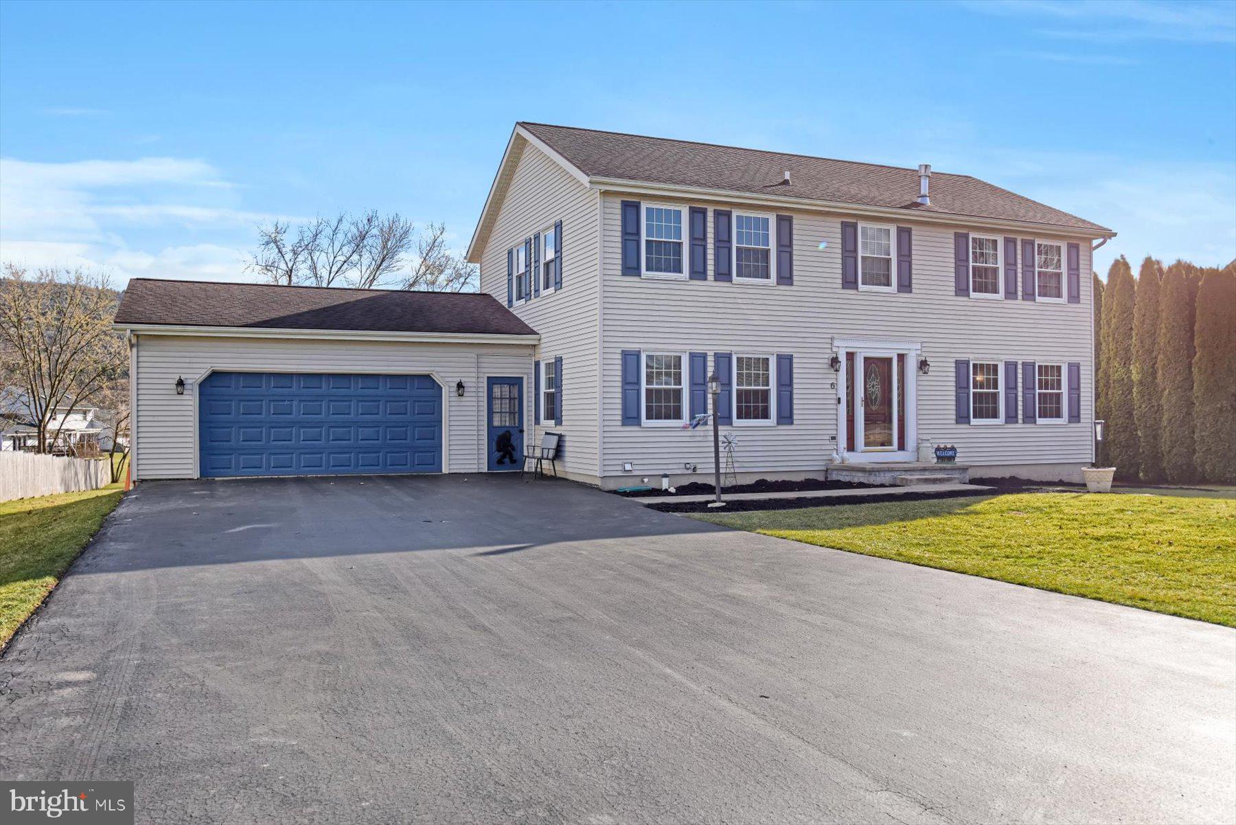 6 James Street Mill Hall, PA 17751 - Photo 3 of 39 a front view of a house with a yard and garage