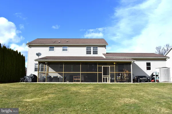a view of a house with a swimming pool
