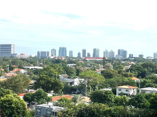 a view of a city with tall buildings
