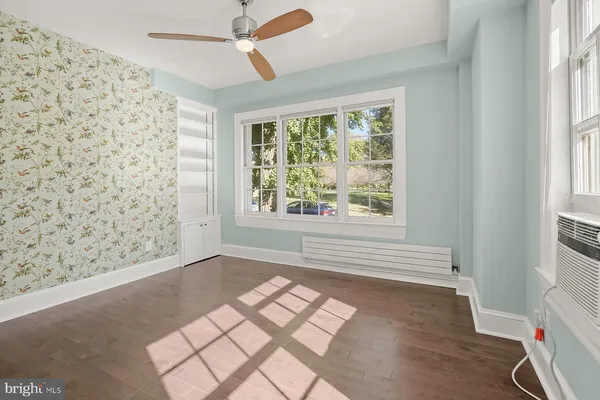 a view of an empty room and window