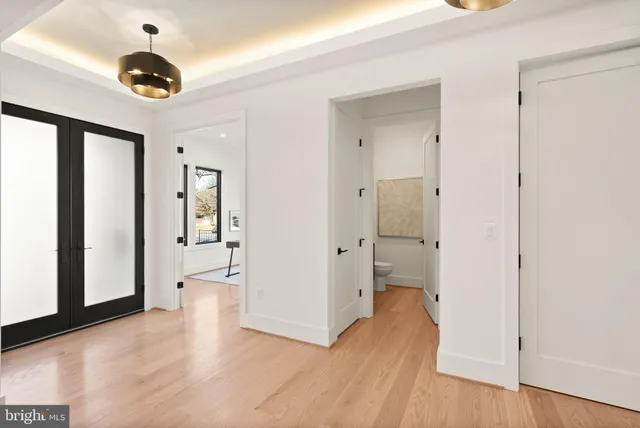 a view of a hallway with white walls
