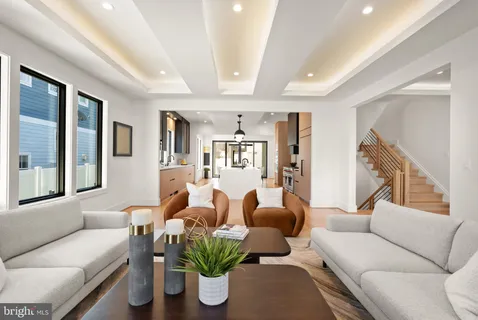 a bedroom with a large bed and a couch