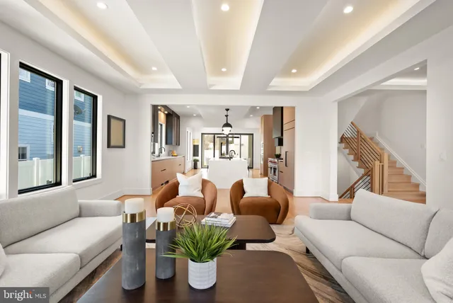 a bedroom with a large bed and a couch