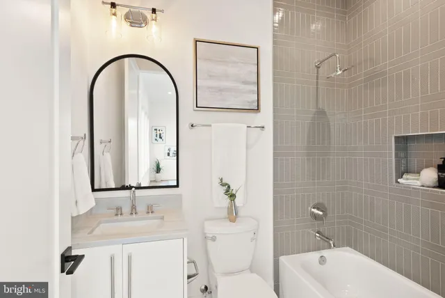 a view of a livingroom with furniture and a dining room