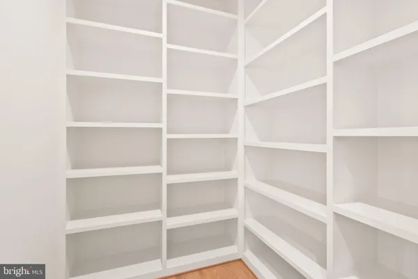 a bathroom with a toilet a sink and shower