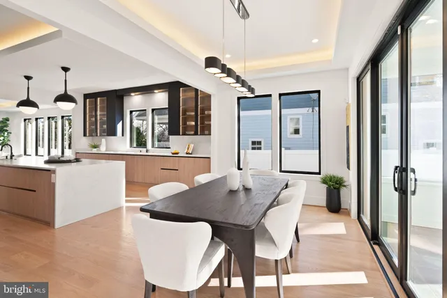 a view of room with wooden floor and window