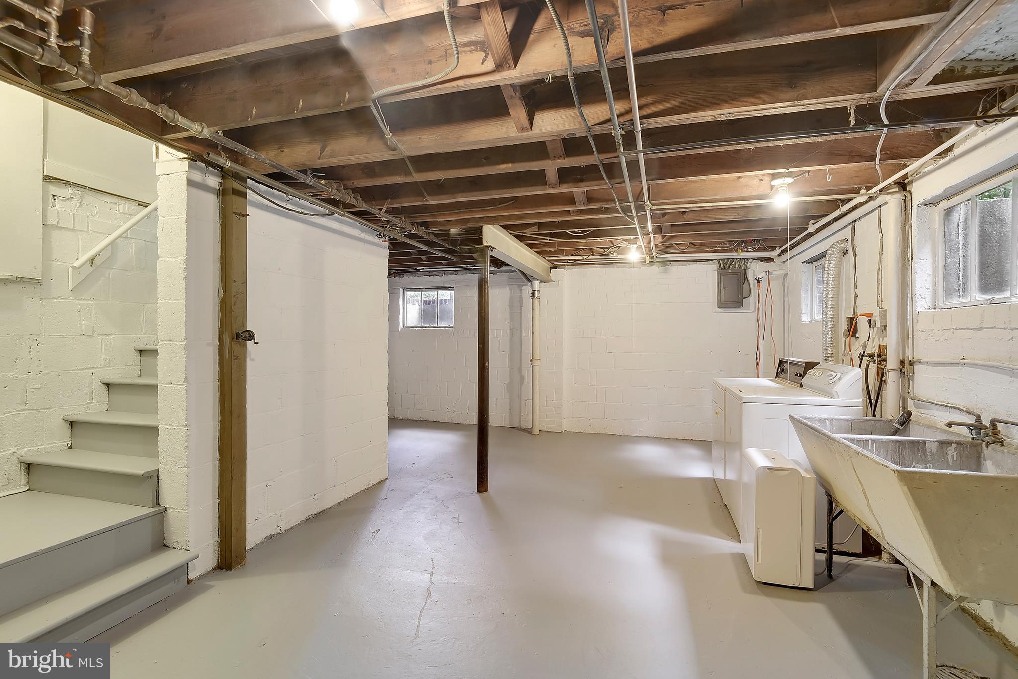 3305 Cameron Mills Road Alexandria, VA 22302 - Photo 23 of 30 Unfinished basement with laundry