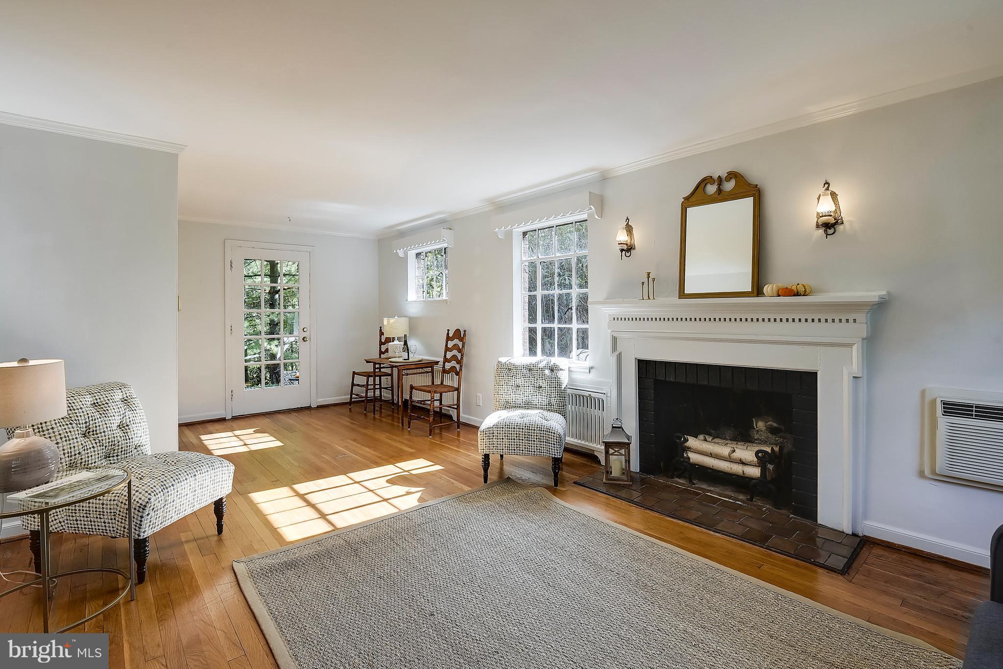 3305 Cameron Mills Road Alexandria, VA 22302 - Photo 4 of 30 Wood-burning fireplace with custom tiles