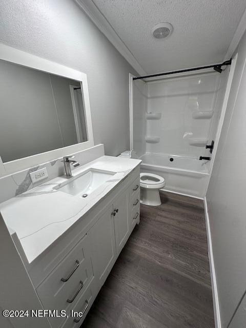 4987 Hemlock Road Macclenny, FL 32063 - Photo 16 of 17 a bathroom with a double vanity sink toilet and shower