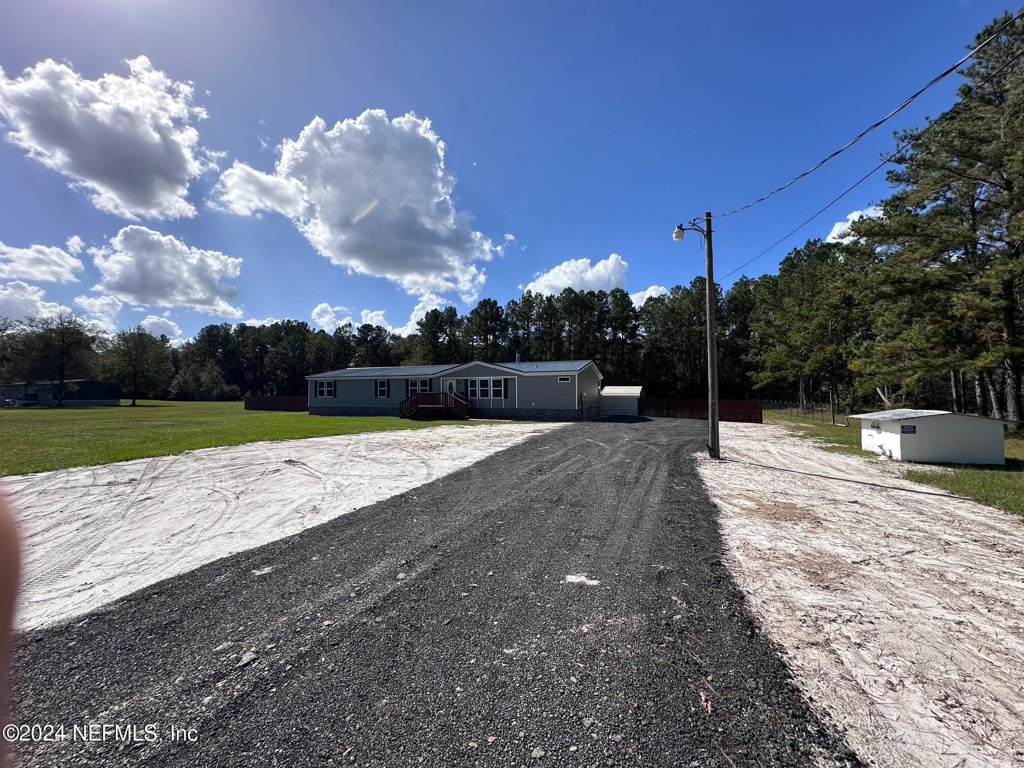 4987 Hemlock Road Macclenny, FL 32063 - Photo 17 of 17 a view of outdoor space with garden and entertaining space
