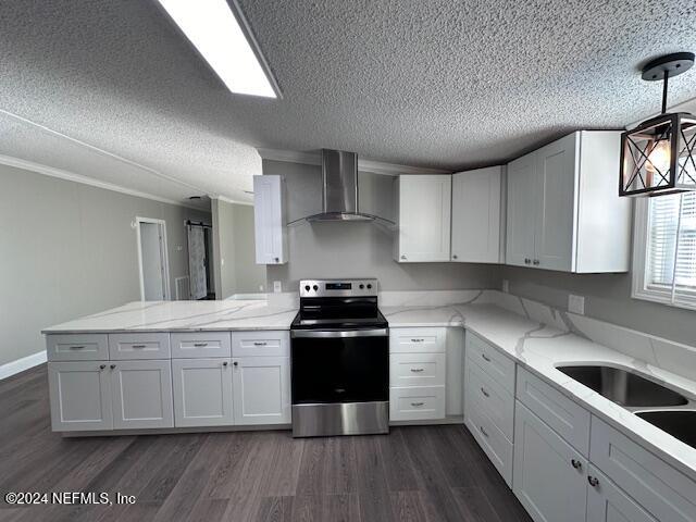 4987 Hemlock Road Macclenny, FL 32063 - Photo 2 of 17 a kitchen with a stove top oven sink and cabinets