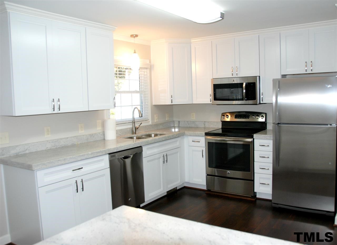 2701 Wycliff Road Raleigh, NC 27607 - Photo 2 of 16 All new Kitchen! New cabinets, hardware, appliances, granite, and lighting.