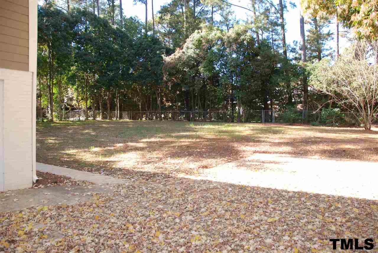 2701 Wycliff Road Raleigh, NC 27607 - Photo 15 of 16 Large backyard. Seller will completing section of fence to have entire back area enclosed.