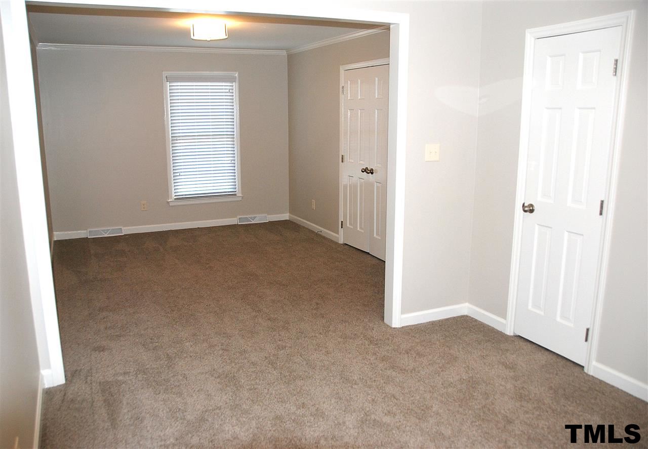2701 Wycliff Road Raleigh, NC 27607 - Photo 7 of 16 Master bedroom features a sitting room and two closets. Master bath features new granite countertops, tile shower and tile flooring.