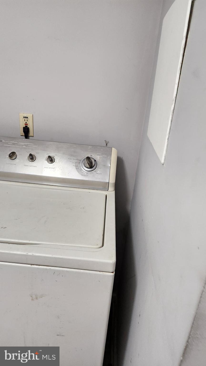 1024 Wicklow Road Baltimore, MD 21229 - Photo 42 of 44 a utility room with dryer and washer