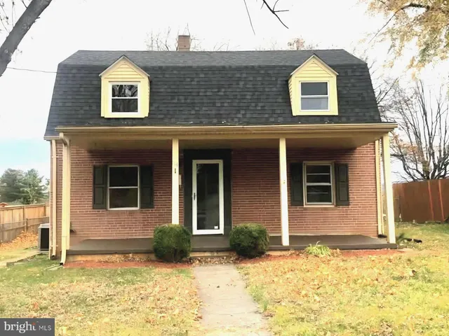 a view of a house with snow on the wall