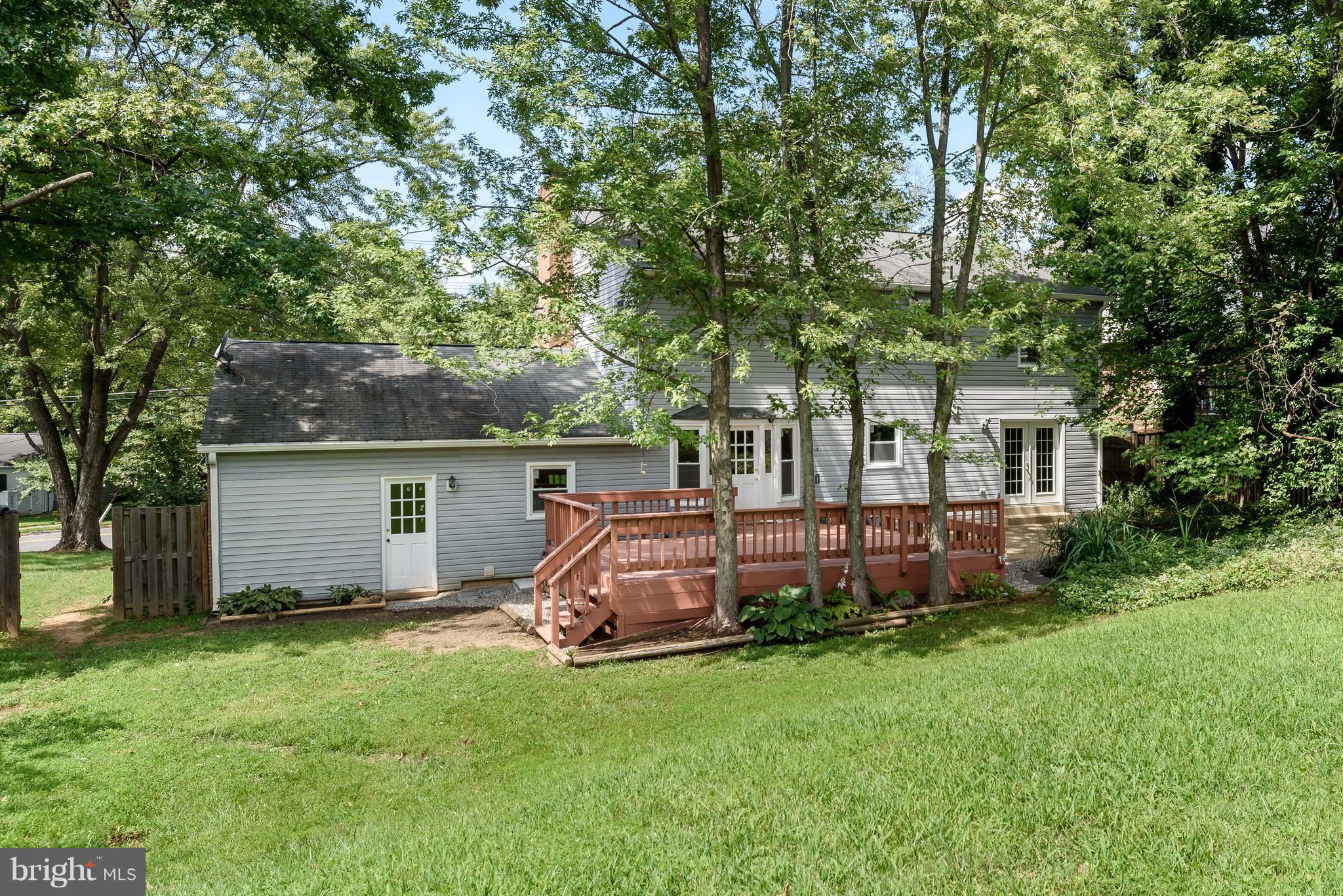 1709 Birch Road McLean, VA 22101 - Photo 12 of 30 a view of a house with backyard and a tree