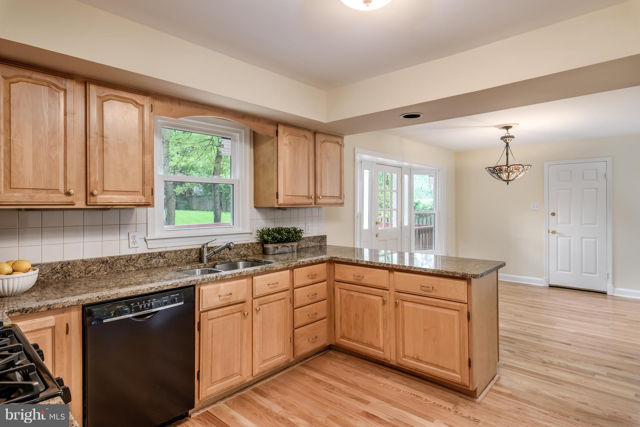 1709 Birch Road McLean, VA 22101 - Photo 14 of 30 a kitchen with a sink stove and window