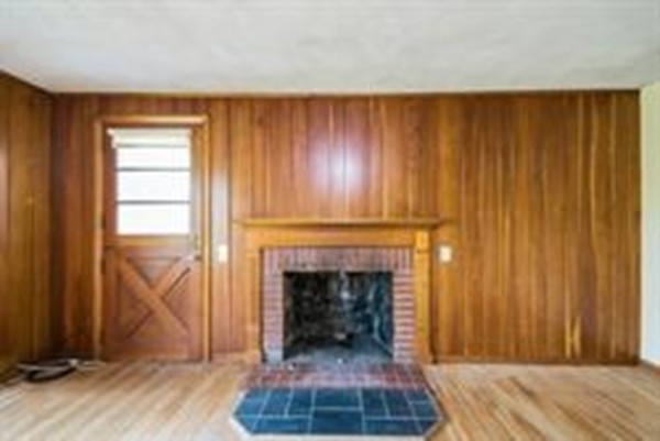 332 Williamsburg Road Conway, MA 01096 - Photo 7 of 10 a living room with furniture and a fireplace