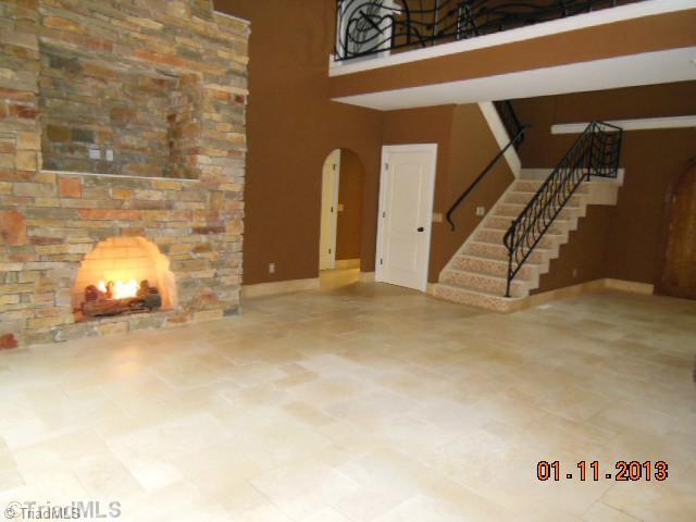 497 Griffith Road Advance, NC 27006 - Photo 3 of 16 Living Room. Floor to ceiling rock fireplace in Living Room