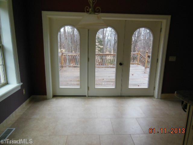 497 Griffith Road Advance, NC 27006 - Photo 6 of 16 Breakfast. Breakfast area looks out to deck