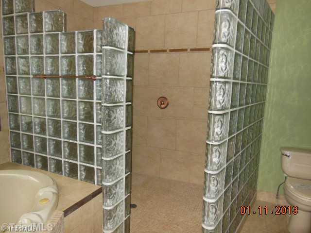497 Griffith Road Advance, NC 27006 - Photo 10 of 16 Master Bath/Spa. Large walk-in shower