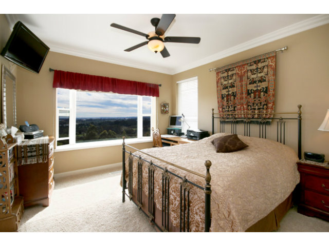 960 Smith Road Watsonville, CA 95076 - Photo 15 of 25 a open kitchen with a table chairs and a stove