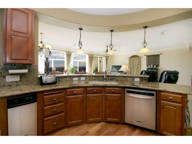 960 Smith Road Watsonville, CA 95076 - Photo 25 of 25 a kitchen with a sink cabinets and wooden floor