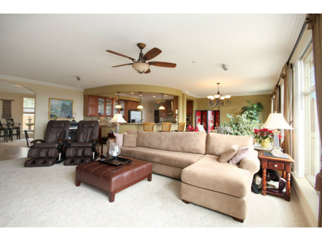 960 Smith Road Watsonville, CA 95076 - Photo 7 of 25 a living room with furniture and a chandelier