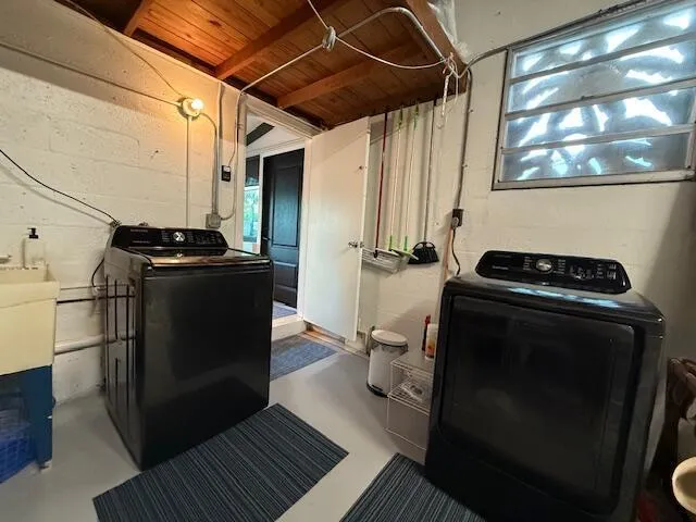 a kitchen with a stove and a refrigerator