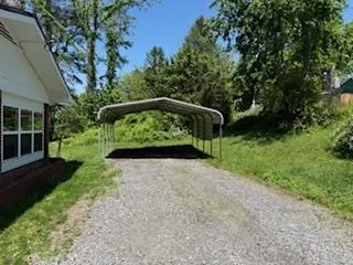 a view of backyard with green space