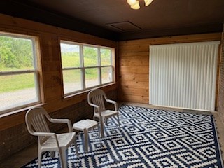 102 Ledford Chapel Road Hayesville, NC 28904 - Photo 23 of 30 a living room with a couch and a table