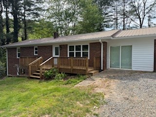 102 Ledford Chapel Road Hayesville, NC 28904 - Photo 9 of 30 a view of a house with a yard and plants