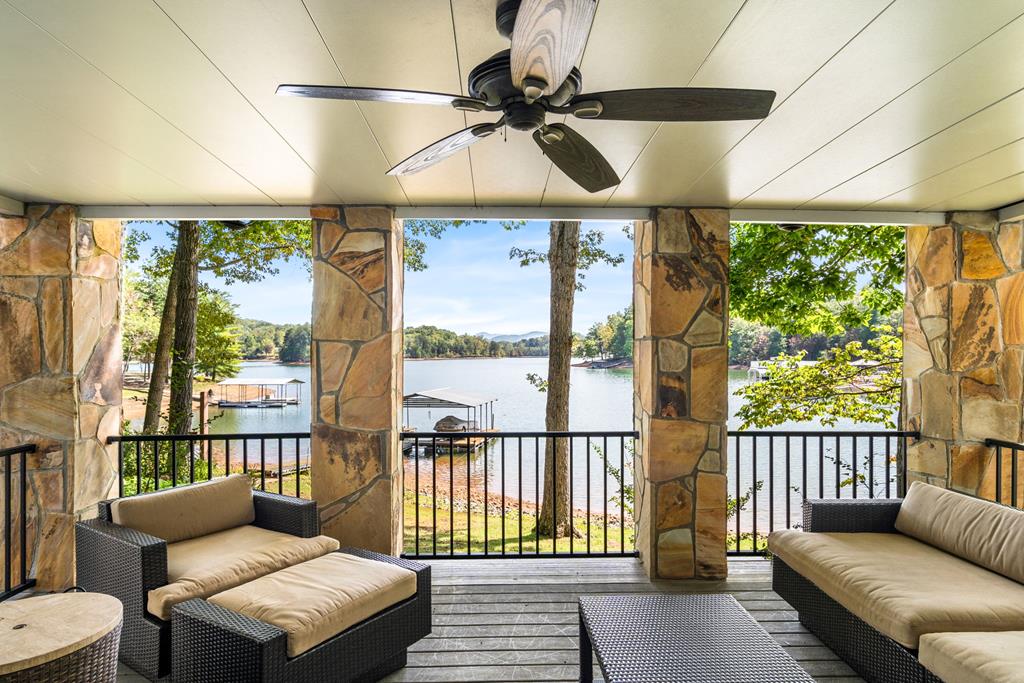 1370 Heathers Cove Circle Hiawassee, GA 30546 - Photo 1 of 99 a living room with furniture and a floor to ceiling window