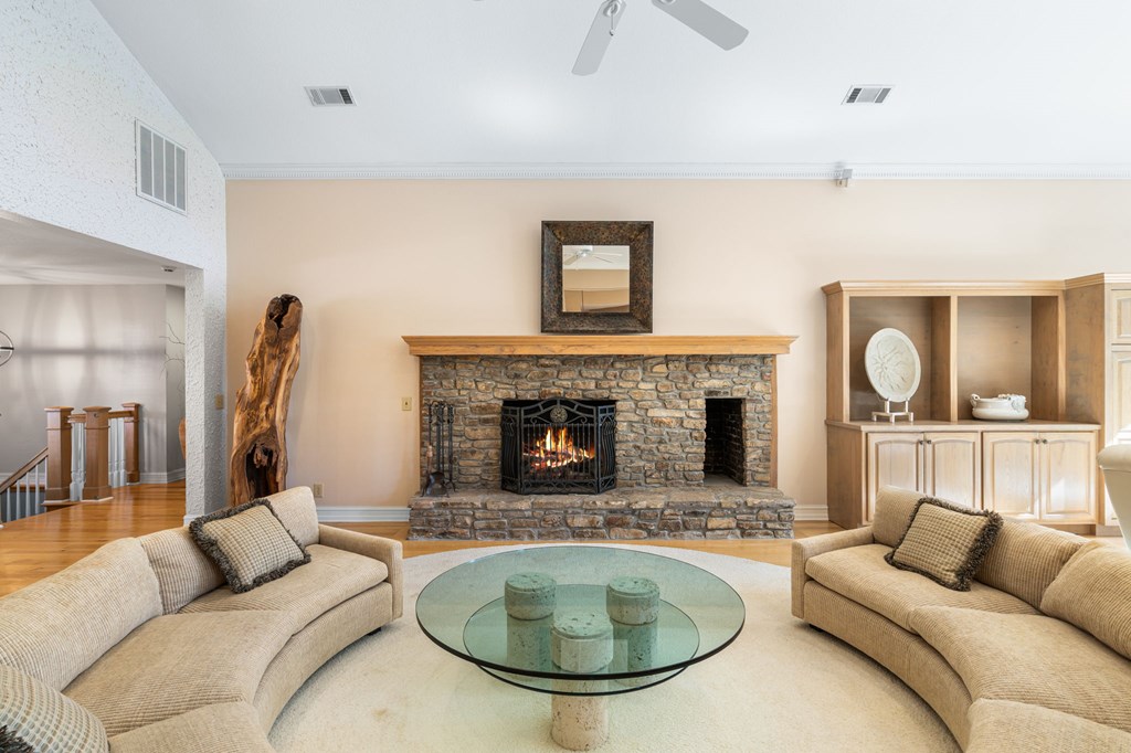 1370 Heathers Cove Circle Hiawassee, GA 30546 - Photo 11 of 99 a living room with furniture a window and a fireplace