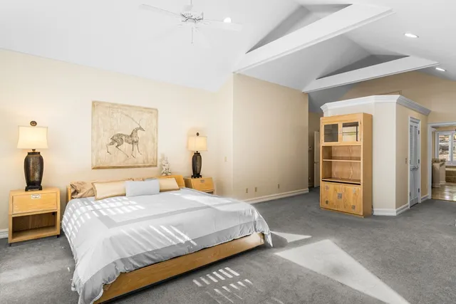 a front view of a house with a yard table and chairs