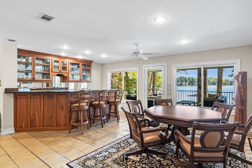 1370 Heathers Cove Circle Hiawassee, GA 30546 - Photo 37 of 99 a view of a dining room with furniture window and outside view