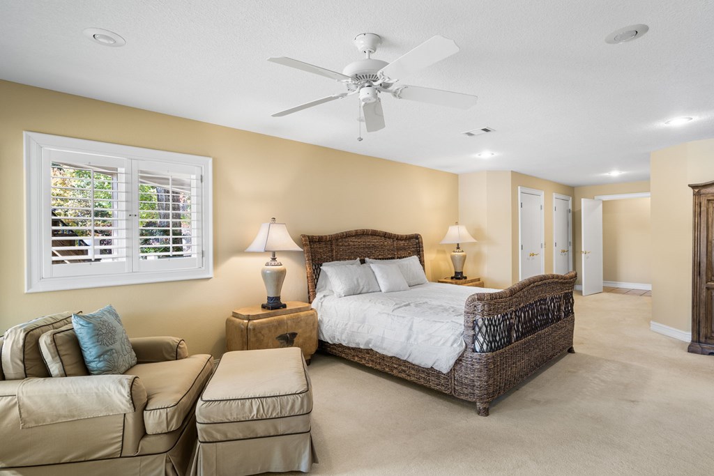 1370 Heathers Cove Circle Hiawassee, GA 30546 - Photo 45 of 99 a bedroom with a bed couch and window