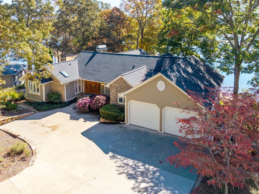 1370 Heathers Cove Circle Hiawassee, GA 30546 - Photo 69 of 99 a view of a house with a yard