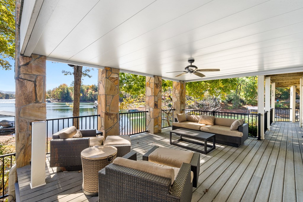 1370 Heathers Cove Circle Hiawassee, GA 30546 - Photo 87 of 99 a living room with furniture and a large window with outer view