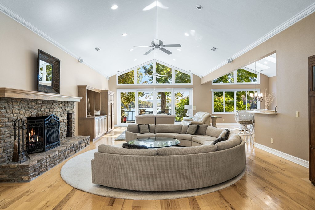 1370 Heathers Cove Circle Hiawassee, GA 30546 - Photo 10 of 99 a living room with furniture and a fireplace