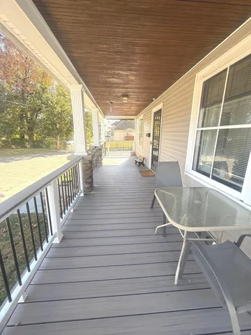 a view of a balcony with chair