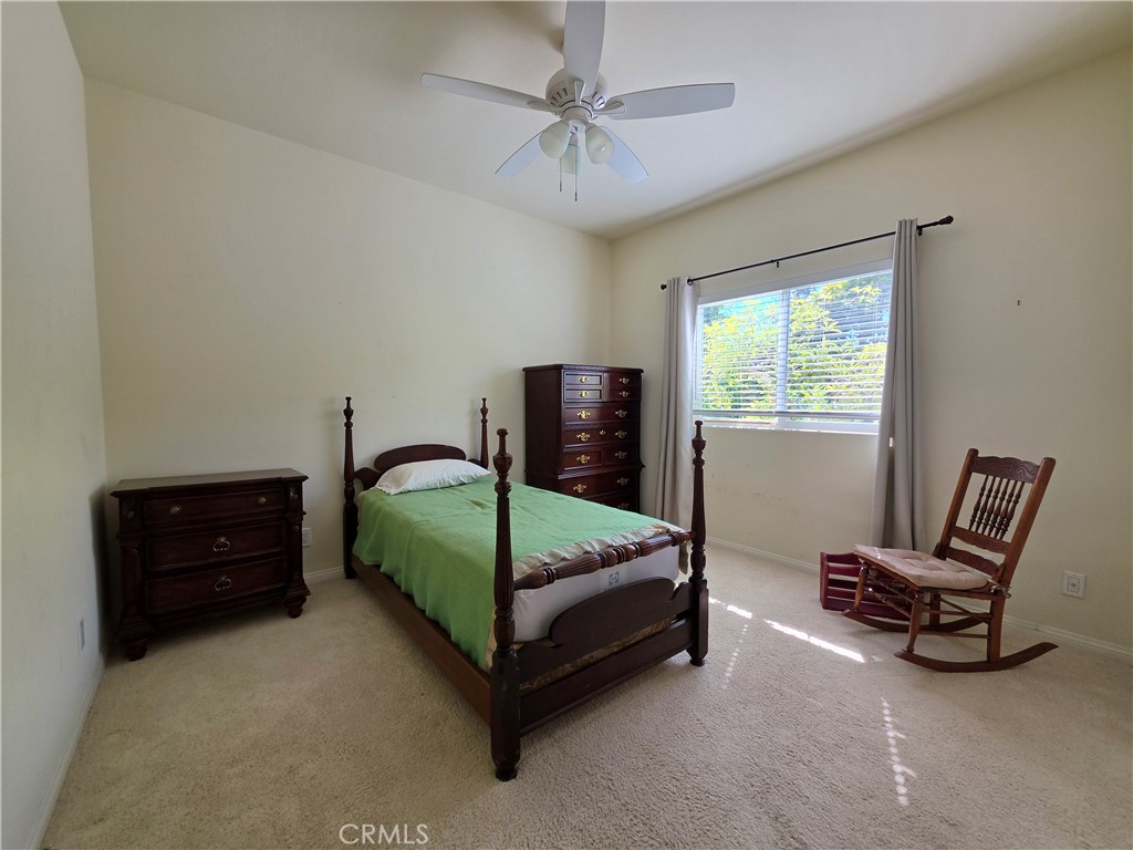 11541 Donovan Road Rossmoor, CA 90720 - Photo 37 of 51 Main level rear bedroom with 9' ceilings and wall-to-wall closet