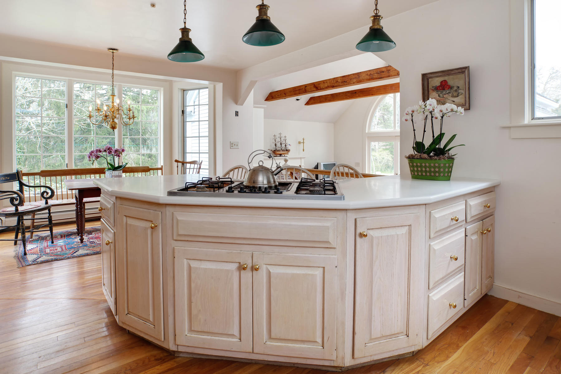 463 Main Street Centerville, MA 02632 - Photo 16 of 36 a room with white cabinets and wooden floor