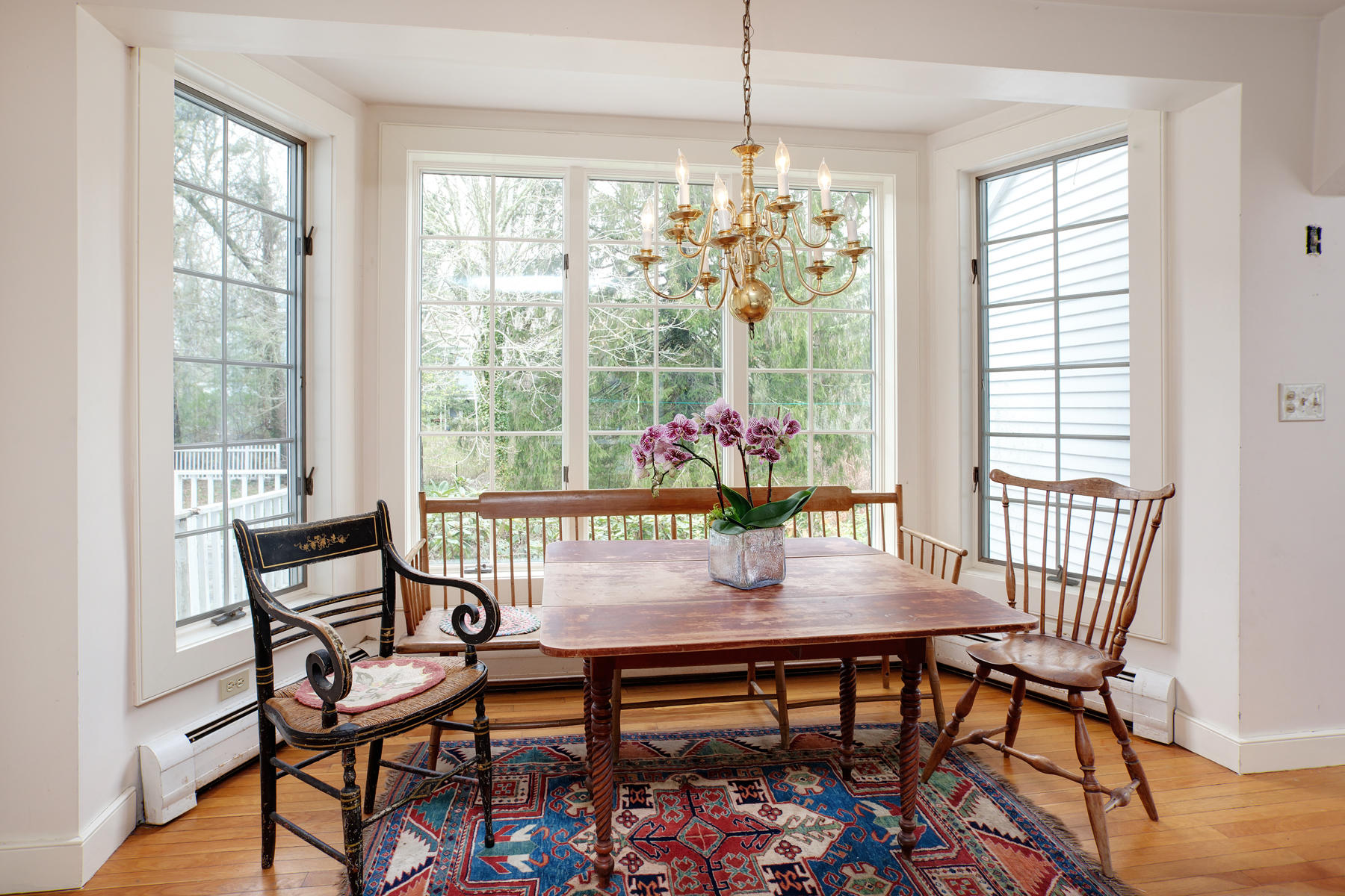 463 Main Street Centerville, MA 02632 - Photo 17 of 36 a view of a dining room with furniture window and outside view