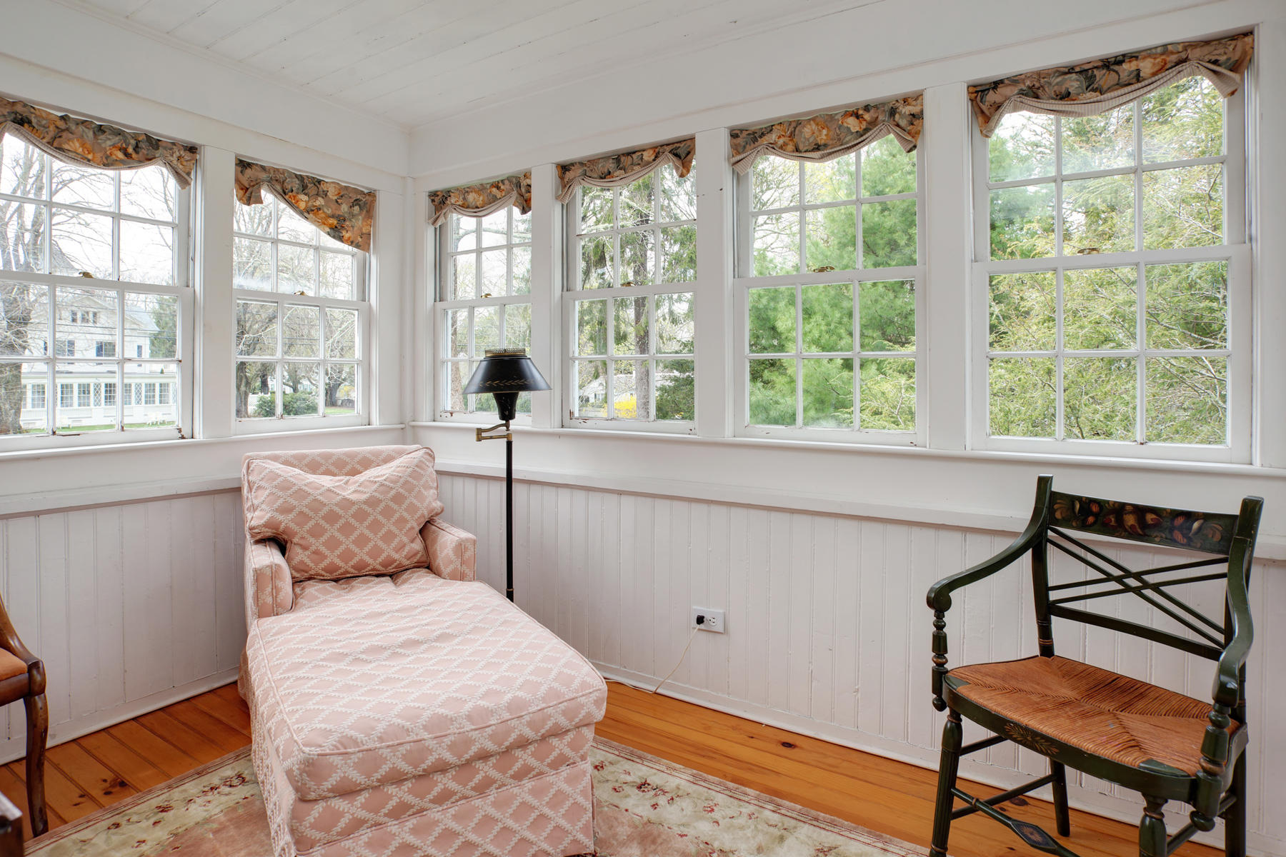 463 Main Street Centerville, MA 02632 - Photo 21 of 36 a bedroom with a bed and large windows