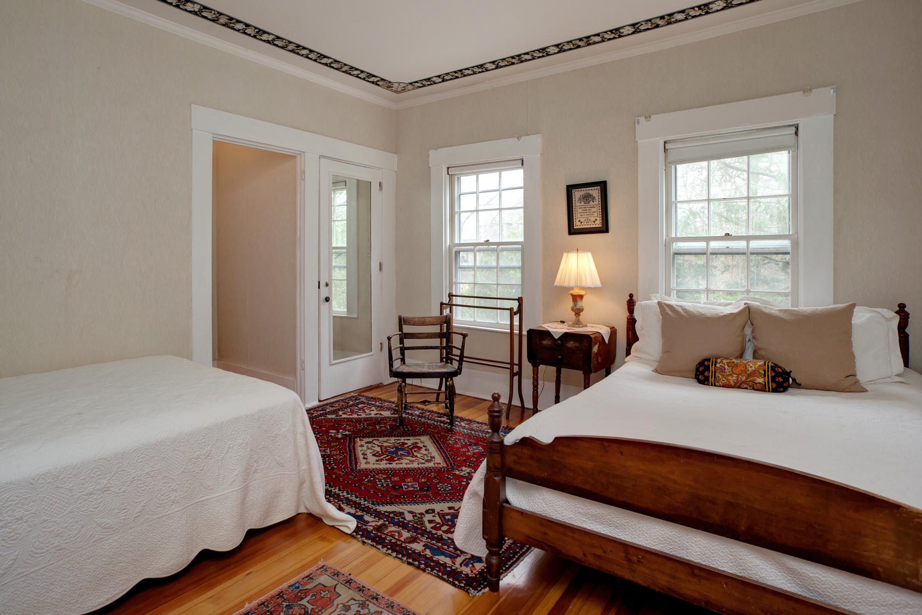 463 Main Street Centerville, MA 02632 - Photo 25 of 36 a bedroom with bed chair and window
